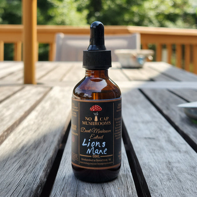 Bottle of 'Lions Mane' mushroom extract on a wooden surface with blurred greenery in the background